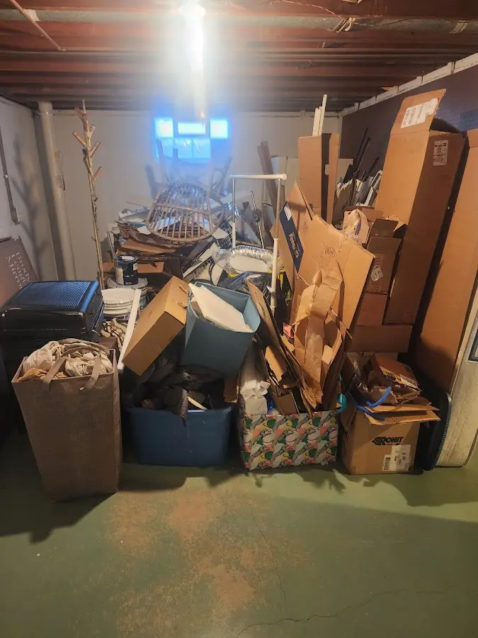 Roll-off dumpster container at job site for 2 Yard Dumpster Rental in Magnolia